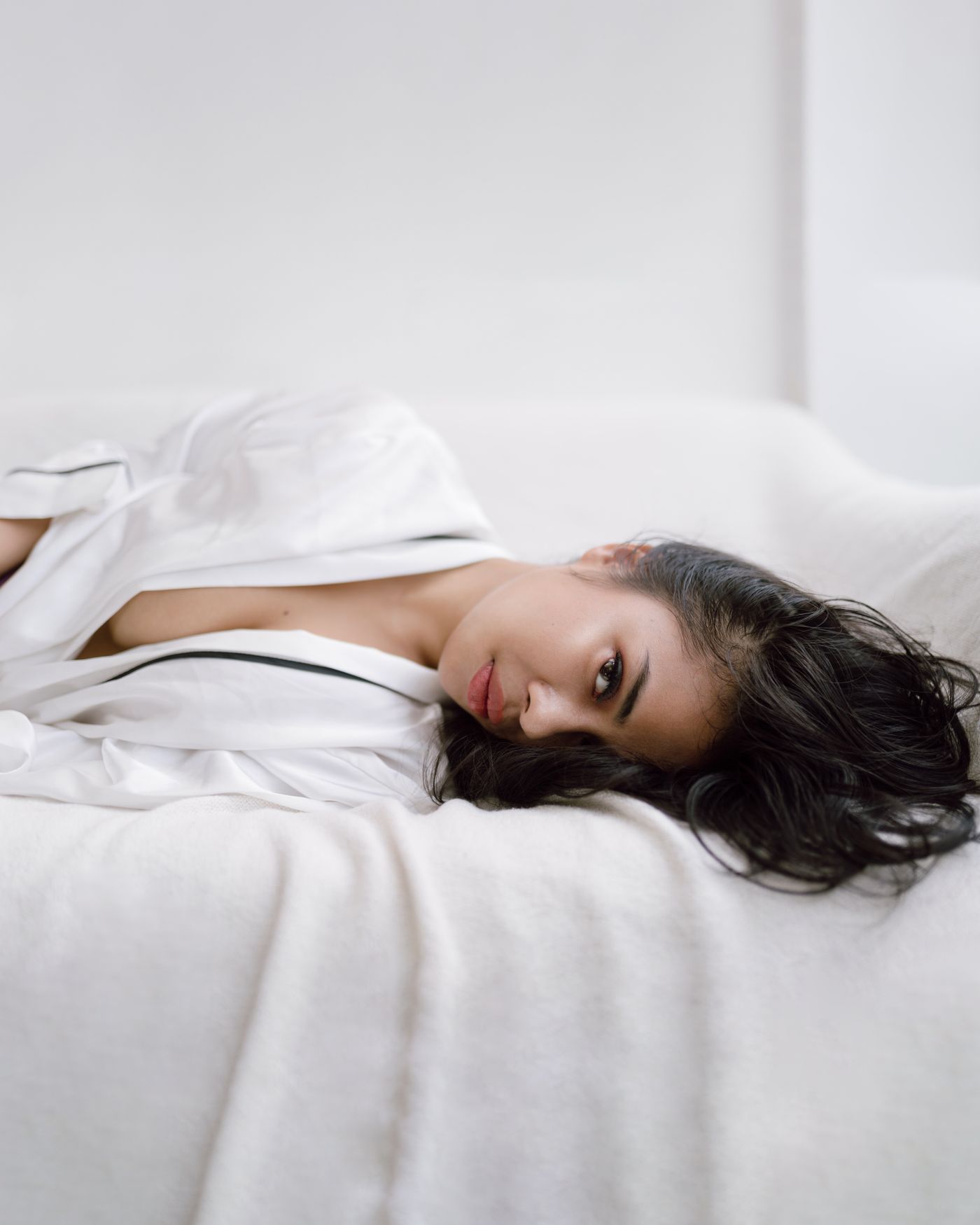 A woman resting in tranquil window light
